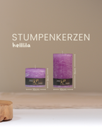 Stumpenkerzen in helllila in zwei Größen mit Angaben zu Höhe und Durchmesser.