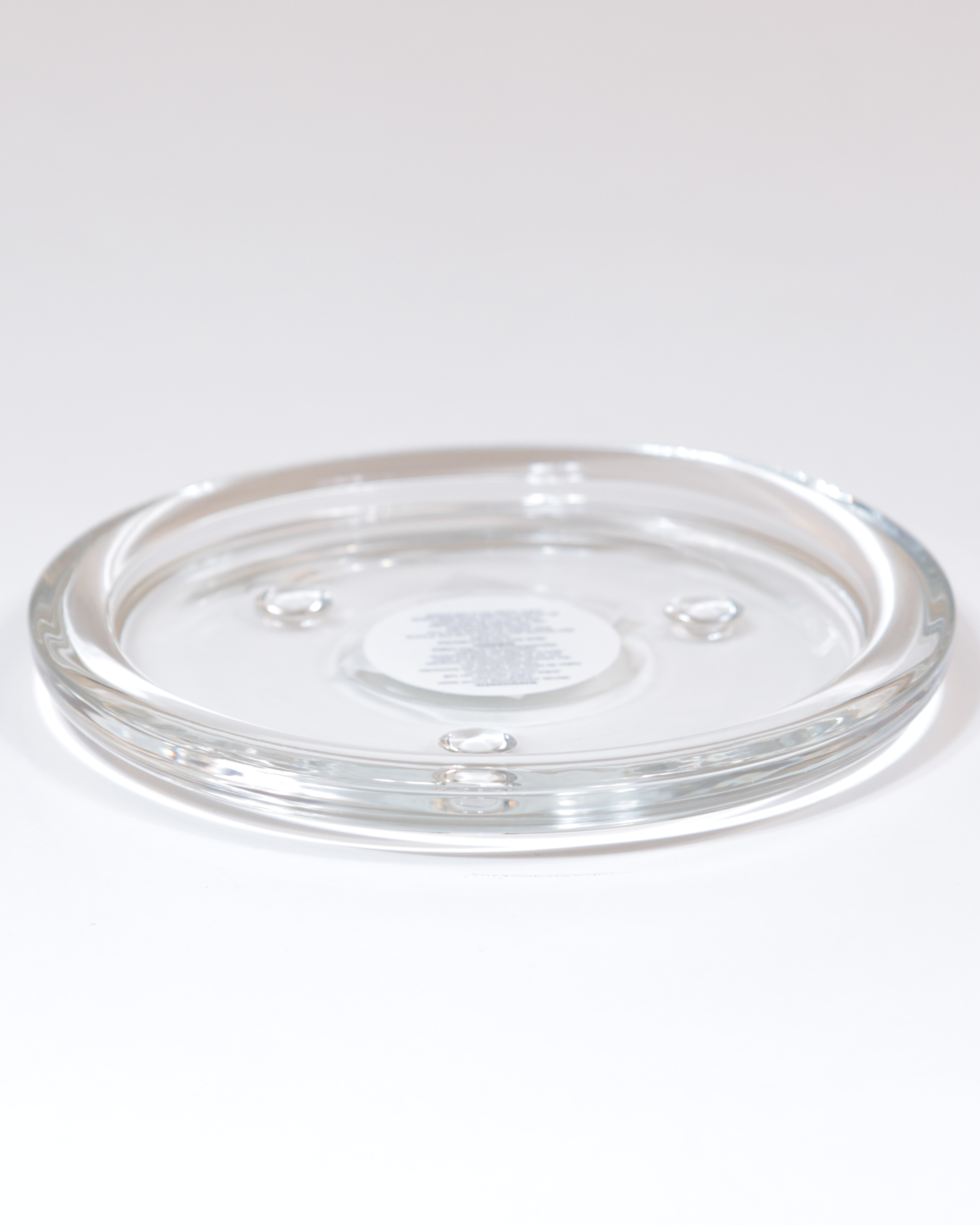 Kerzenteller aus klarem Glas mit glatter Oberfläche in der großen Größe.